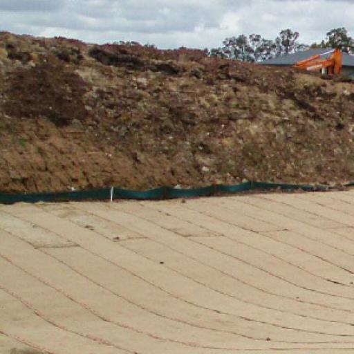 PROVIDING EROSION CONTROL AND REVEGETATING TO SUIT LANDFORM